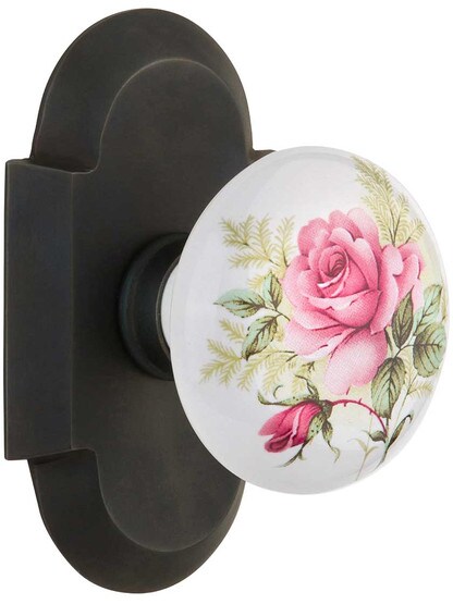 Arched Rosette Door Set with Rose Porcelain Knobs in Oil-Rubbed Bronze.